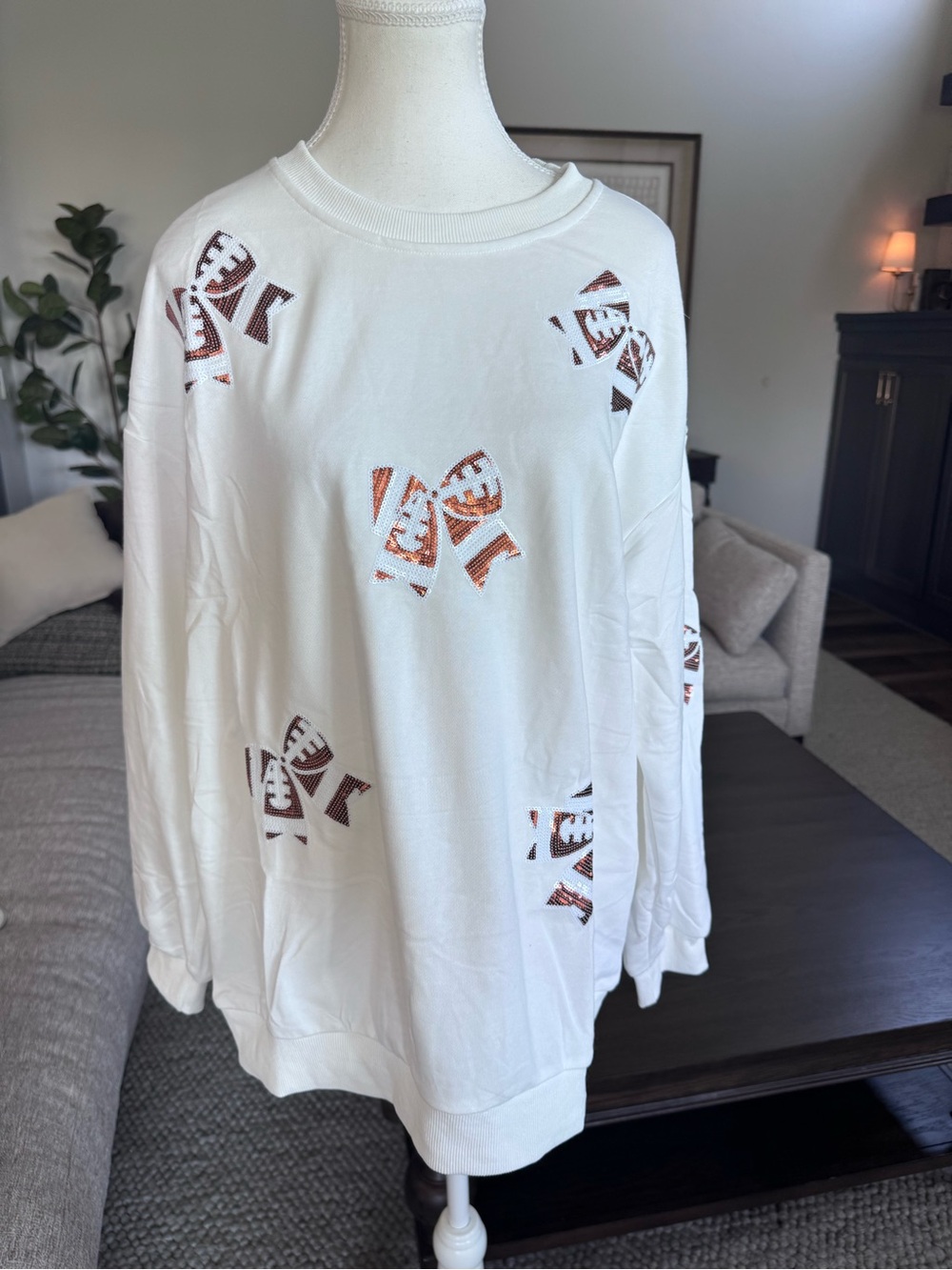 BRAND NEW Women’s Large White Sweatshirt with Brown Football Bow Sequin Cutouts